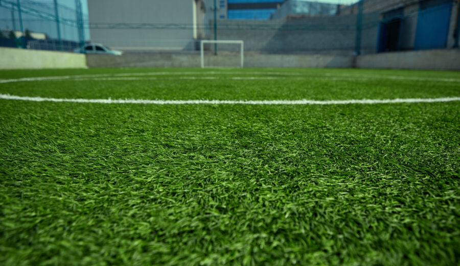 The empty football field and green grass