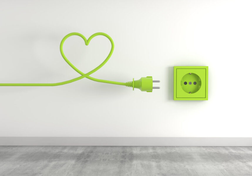 3D render of a green electrical plug isolated on a socket background- eco energy concept